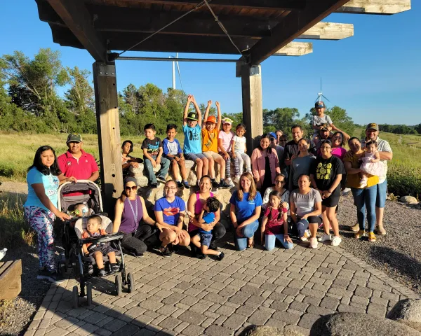 Group photo of families from the Morris, MN area enjoying an outing put on by Conexiones.