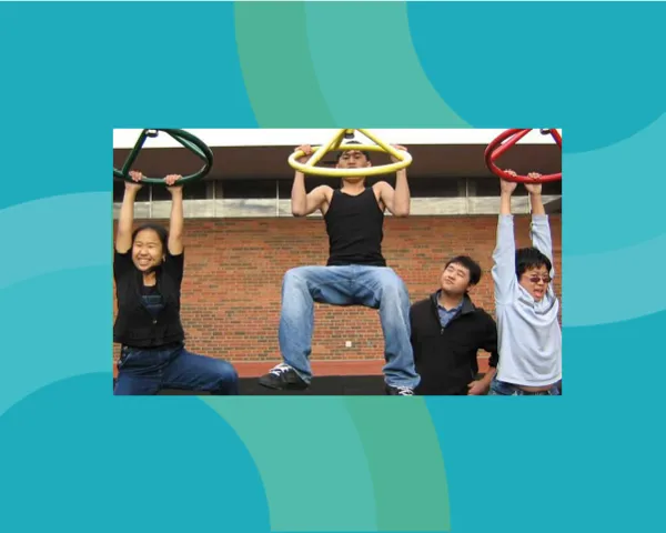 Teenagers on playground equipment