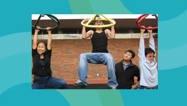 Teenagers on playground equipment