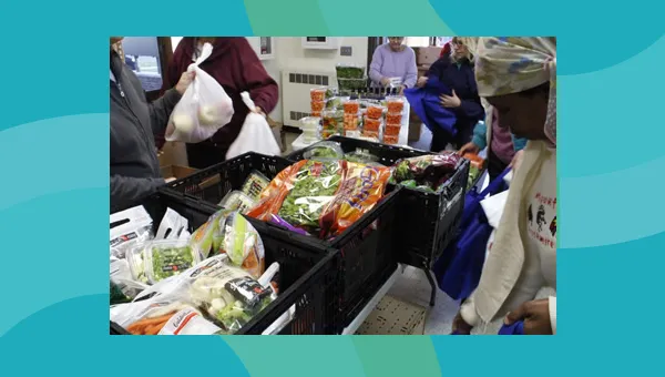 People choosing food at a food shelf